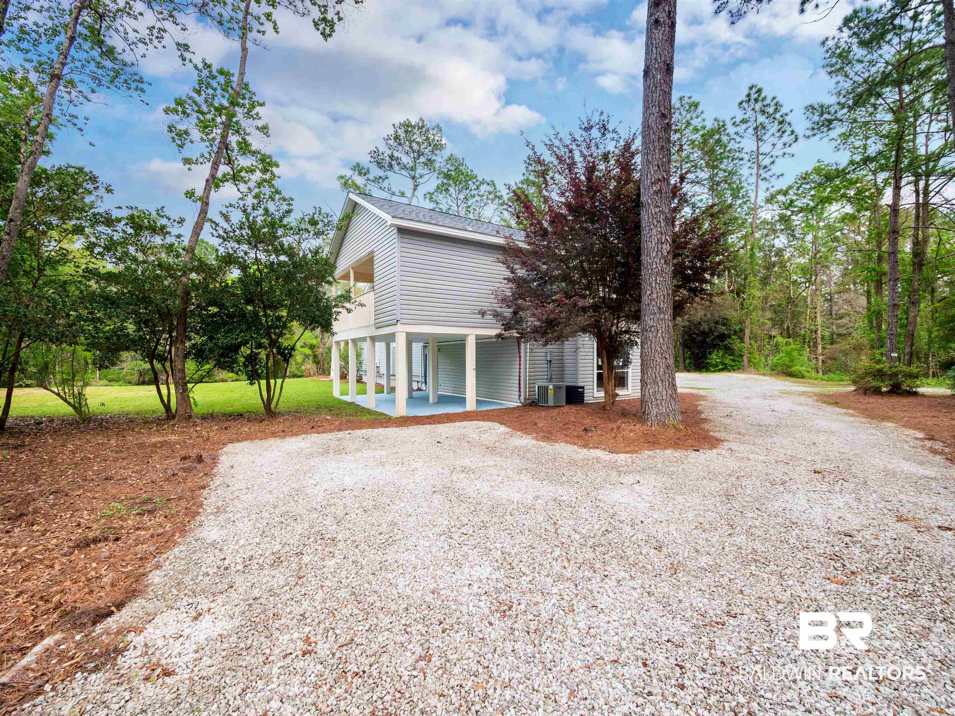 12831 Clay City Road Fairhope, AL 36532 - Photo 27 of 47 Tons of parking, covered area beside garage