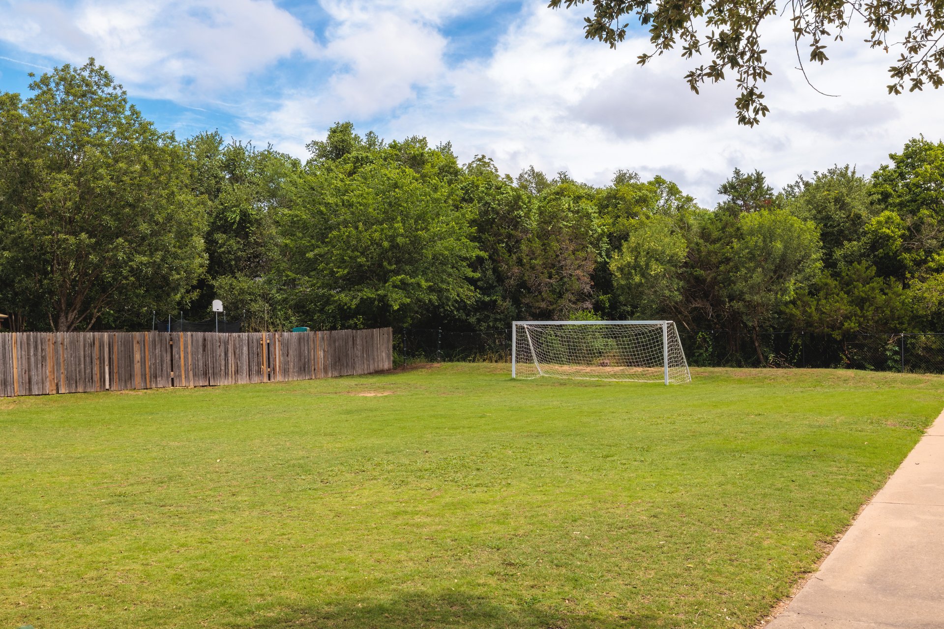 7000 Bending Oak Road Austin, TX 78749 - Photo 39 of 39 a view of a swimming pool with a yard
