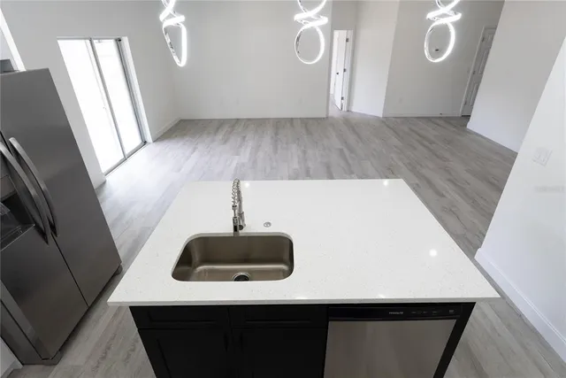 a view of a livingroom with wooden floor