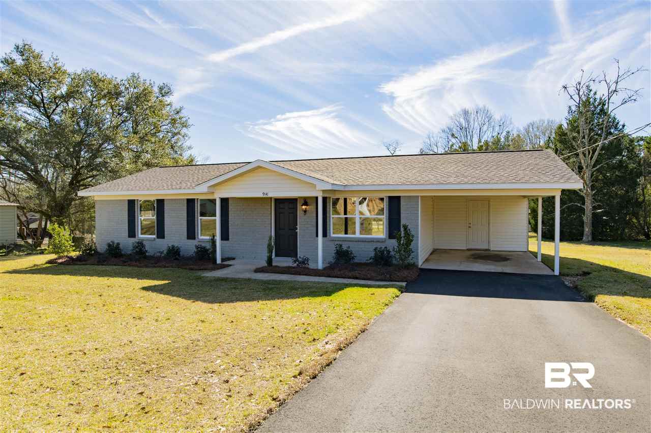 9141 Semmes Court Semmes, AL 36575 - Photo 22 of 28 Laundry room has inside or outside access.