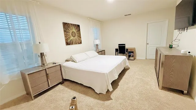 a view of a house with a yard and garage