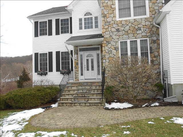 415 Rossway Road Pleasant Valley, NY 12569 - Photo 1 of 1 a front view of a house with a yard
