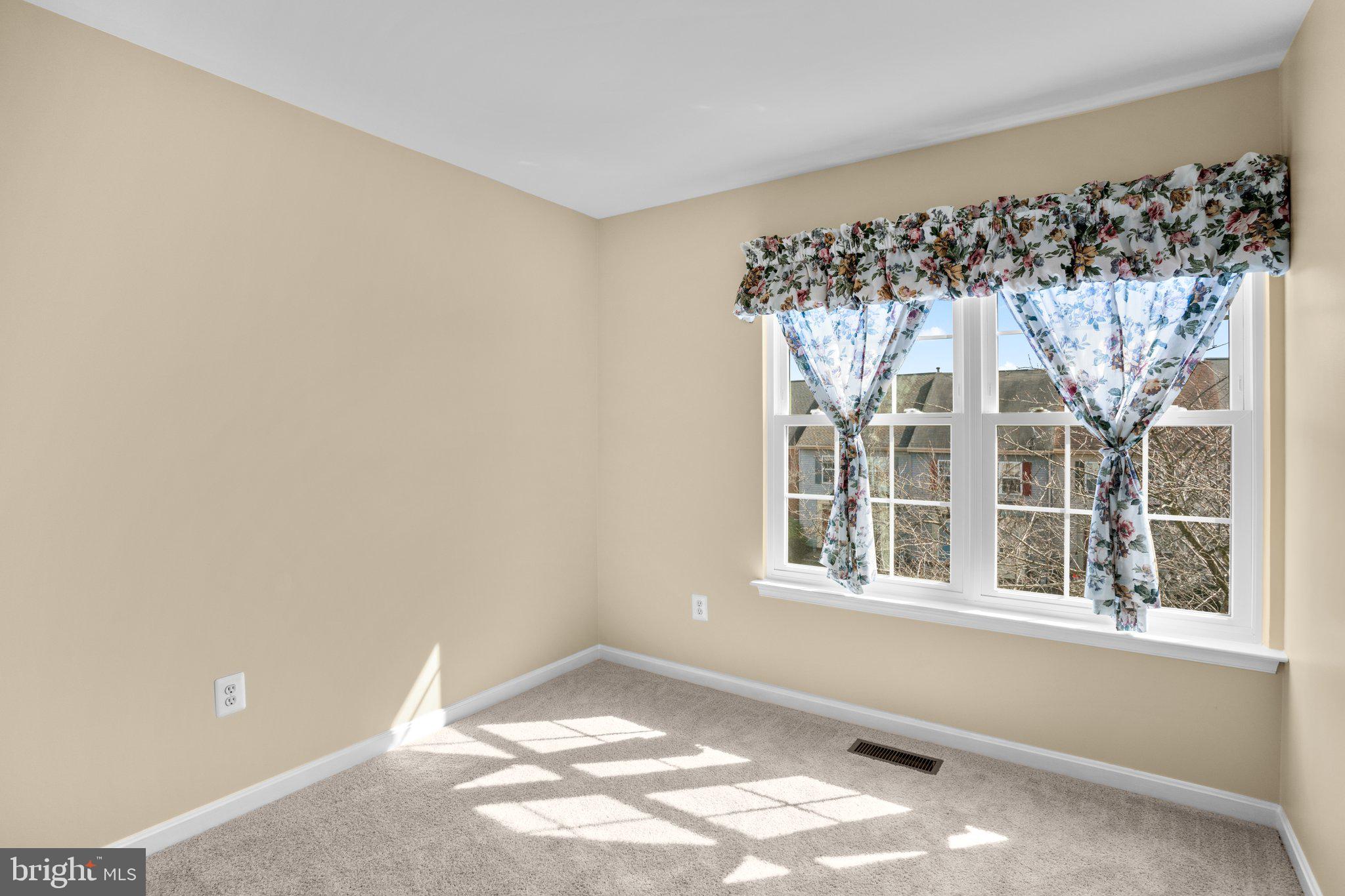 6342 Arbor Way Elkridge, MD 21075 - Photo 24 of 30 a view of a window in an empty room