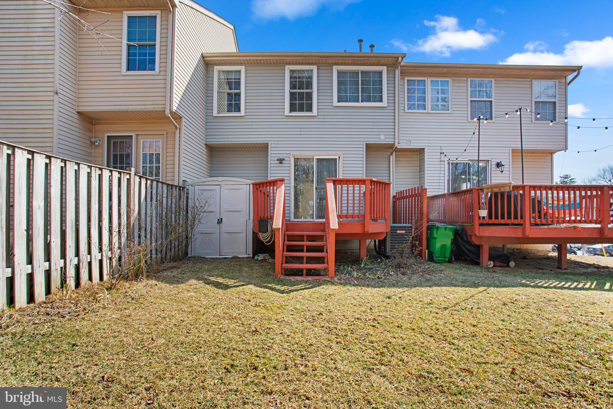 6342 Arbor Way Elkridge, MD 21075 - Photo 30 of 30 a backyard of a house with barbeque oven and outdoor seating