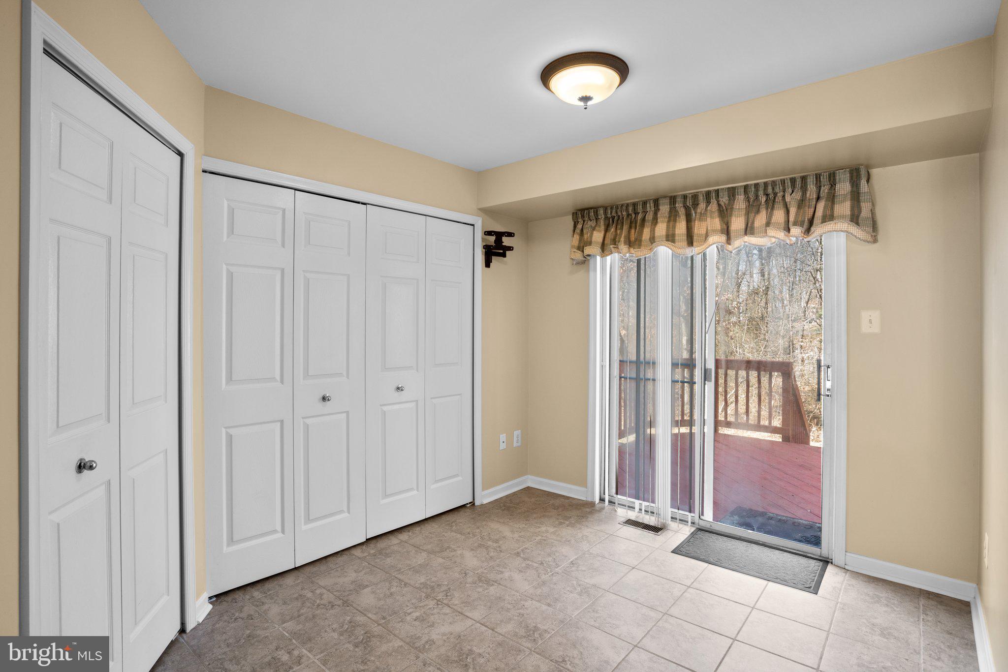 6342 Arbor Way Elkridge, MD 21075 - Photo 8 of 30 a view of an empty room and window