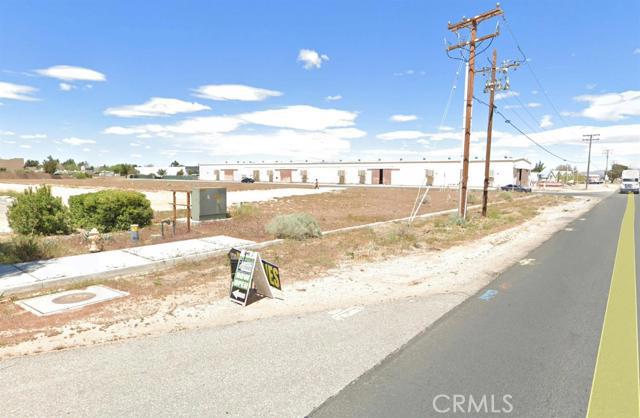 13492 Central Road Apple Valley, CA 92308 - Photo 7 of 7 a swimming pool view with a lake view
