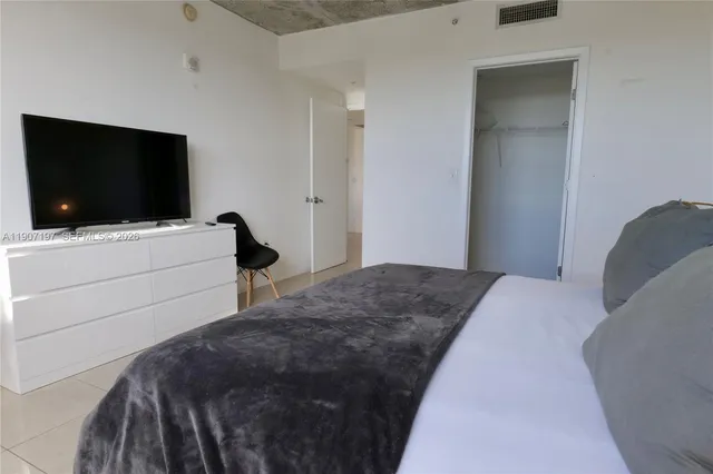 a view of a livingroom with a window