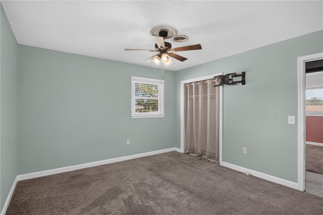 118 Bryson Road Anderson, SC 29625 - Photo 13 of 36 Plush carpet flooring runs throughout this versatile space featuring dual closets and crisp trim details.