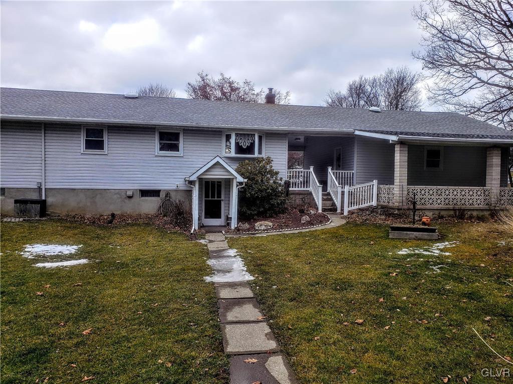2415 Yost Road Bath, PA 18014 - Photo 6 of 30 a front view of a house with garden