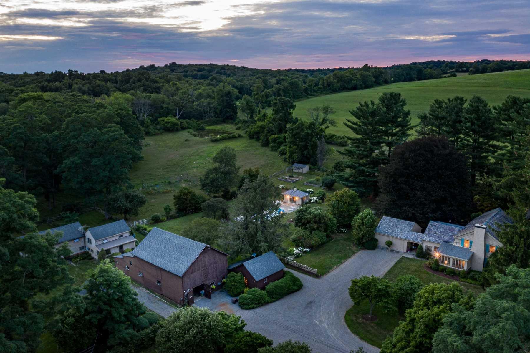 an aerial view of a house with outdoor space
