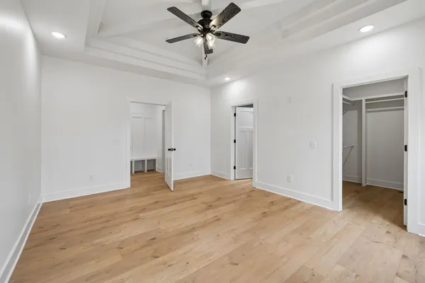a view of a livingroom with a ceiling fan