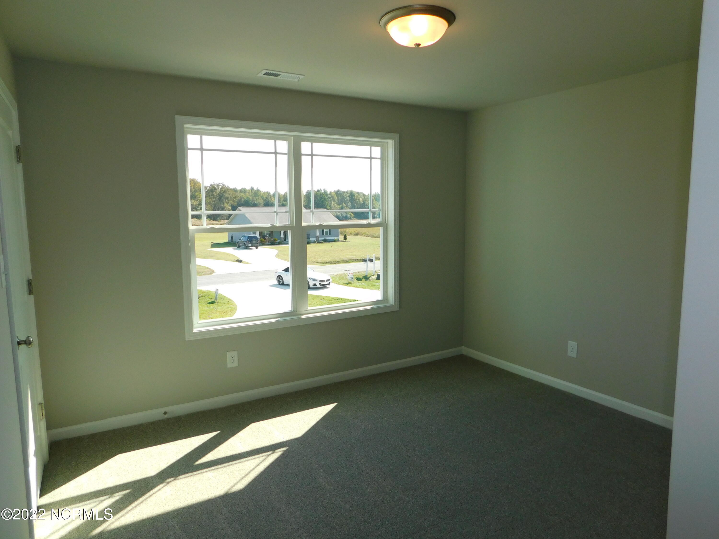 4125 Nahunta Road Pikeville, NC 27863 - Photo 18 of 22 Bedroom 2