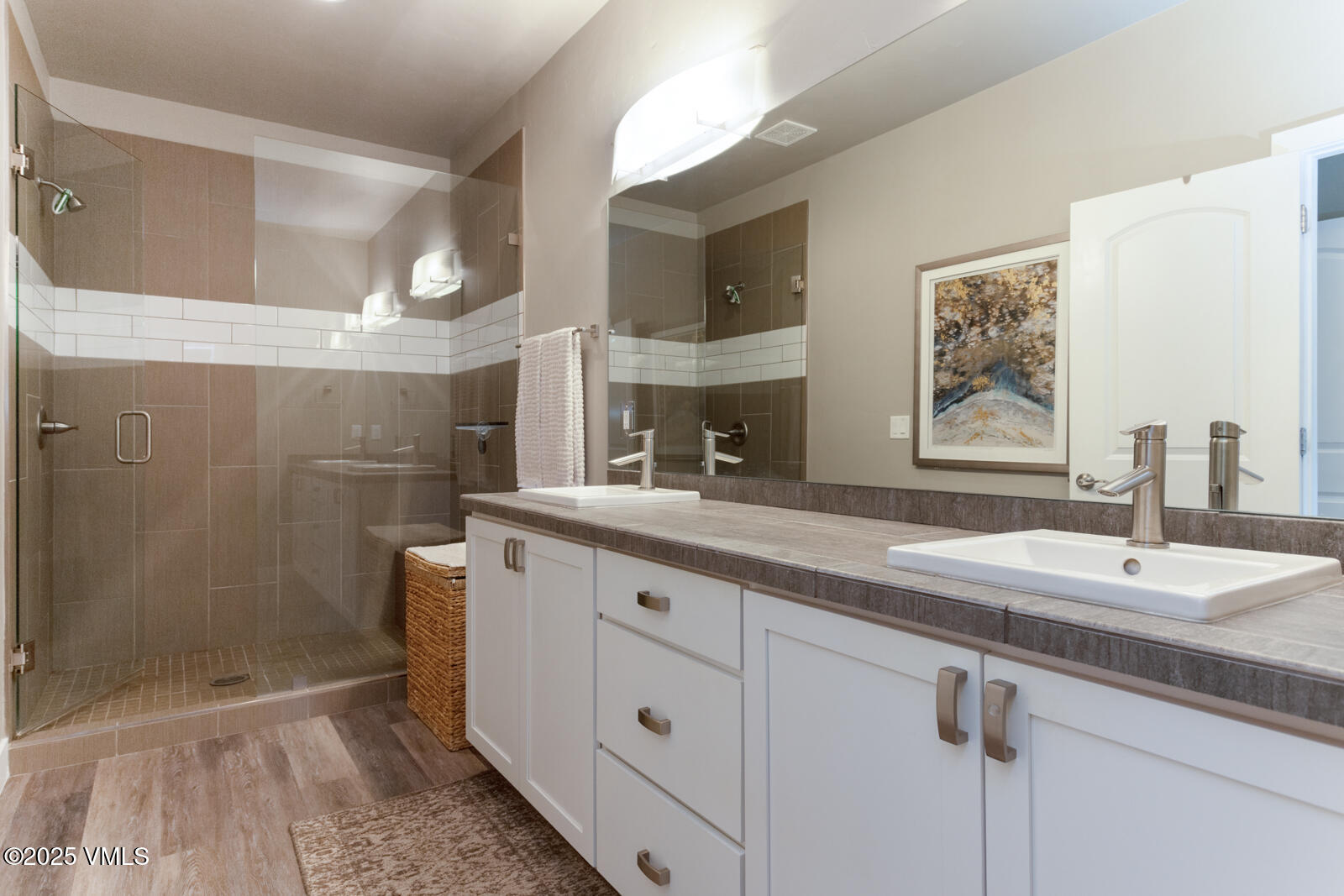 25 Soleil Circle Eagle, CO 81631 - Photo 23 of 48 a bathroom with a double vanity sink mirror and shower