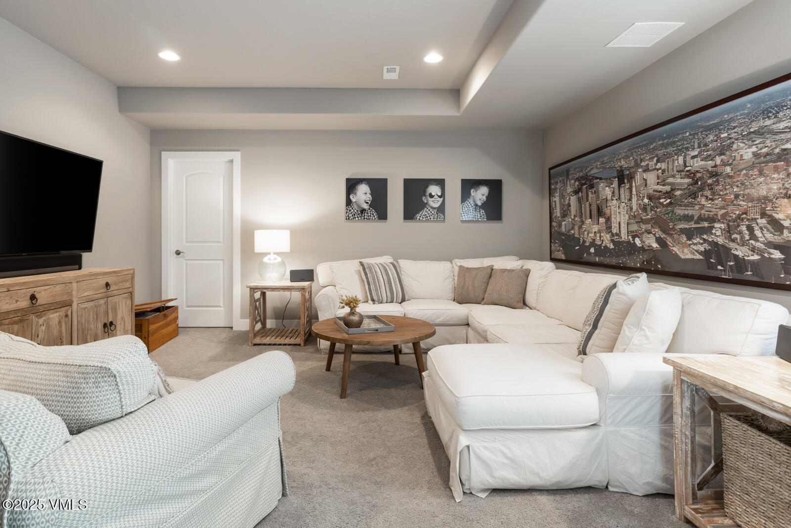 25 Soleil Circle Eagle, CO 81631 - Photo 32 of 48 a living room with furniture and a flat screen tv