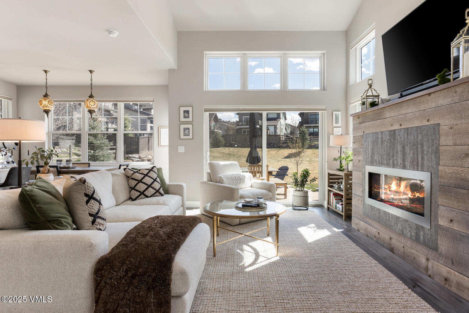 25 Soleil Circle Eagle, CO 81631 - Photo 7 of 48 a living room with fireplace furniture and a flat screen tv