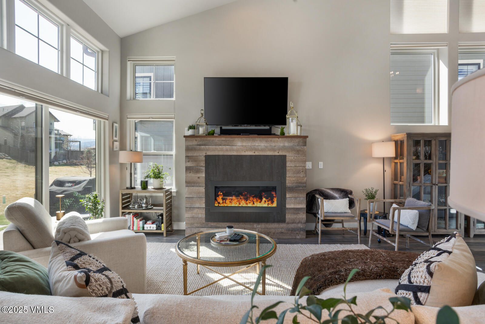 25 Soleil Circle Eagle, CO 81631 - Photo 8 of 48 a living room with fireplace furniture and a flat screen tv