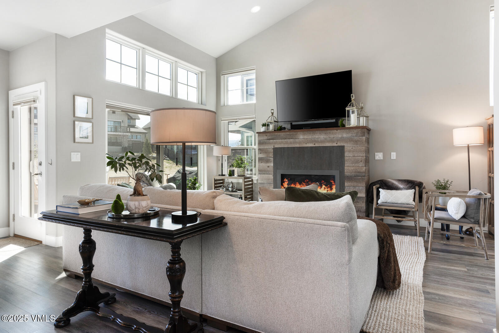 25 Soleil Circle Eagle, CO 81631 - Photo 9 of 48 a living room with furniture and a fireplace