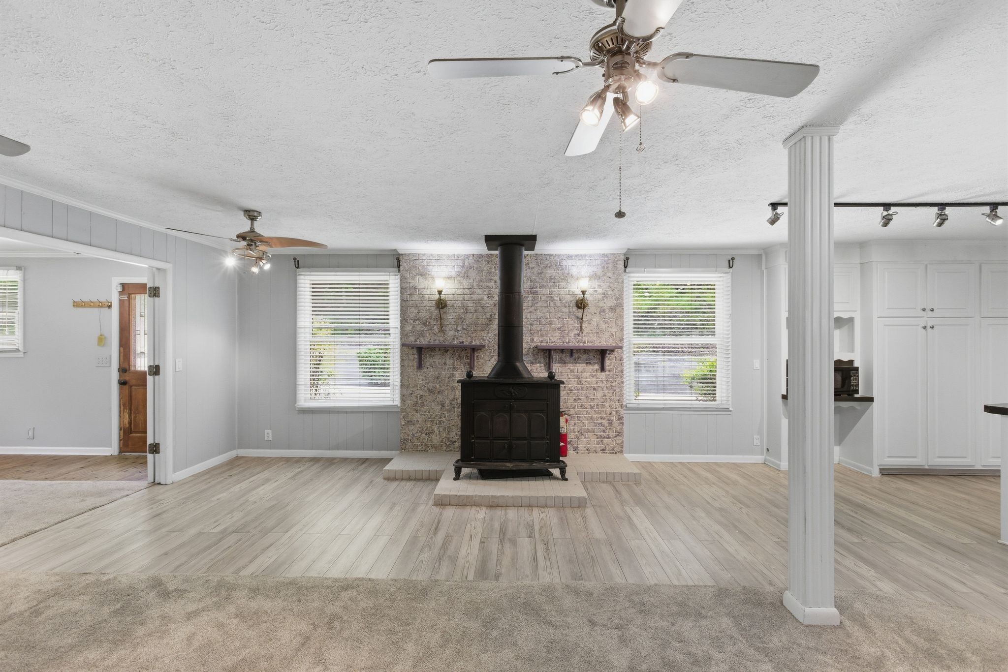 580 Defeated Creek Road Centerville, TN 37033 - Photo 22 of 71 a living room with furniture and a fireplace