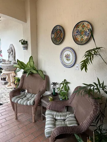 a view of a workspace with furniture