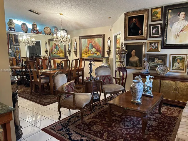 a living room with lots of furniture and decor