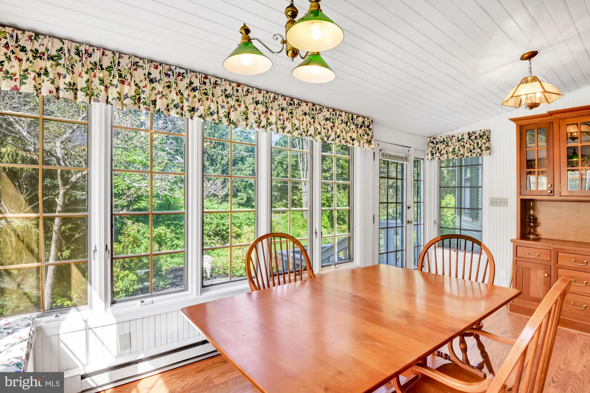 1015 Windsor Road Baltimore, MD 21208 - Photo 15 of 27 Step down breakfast area overlooking gardens