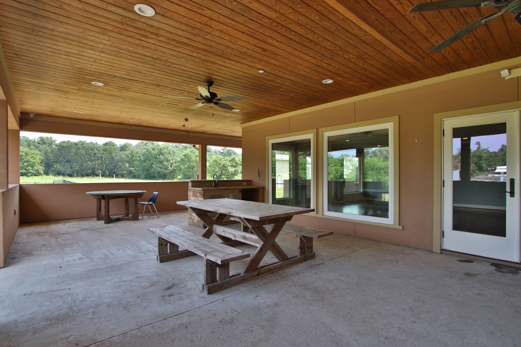 17018 Grant Road Cypress, TX 77429 - Photo 41 of 50 a swimming pool with outdoor seating and yard