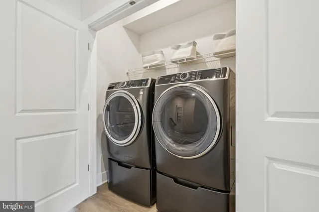 a utility room with dryer and washer