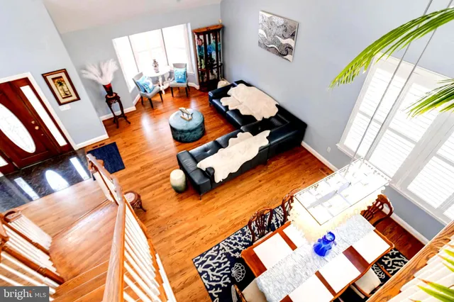 a view of a kitchen with granite countertop cabinets and a refrigerator