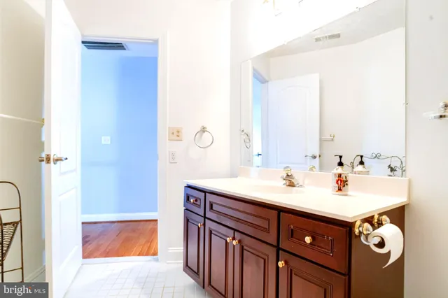 a view of a water fountain and a big yard