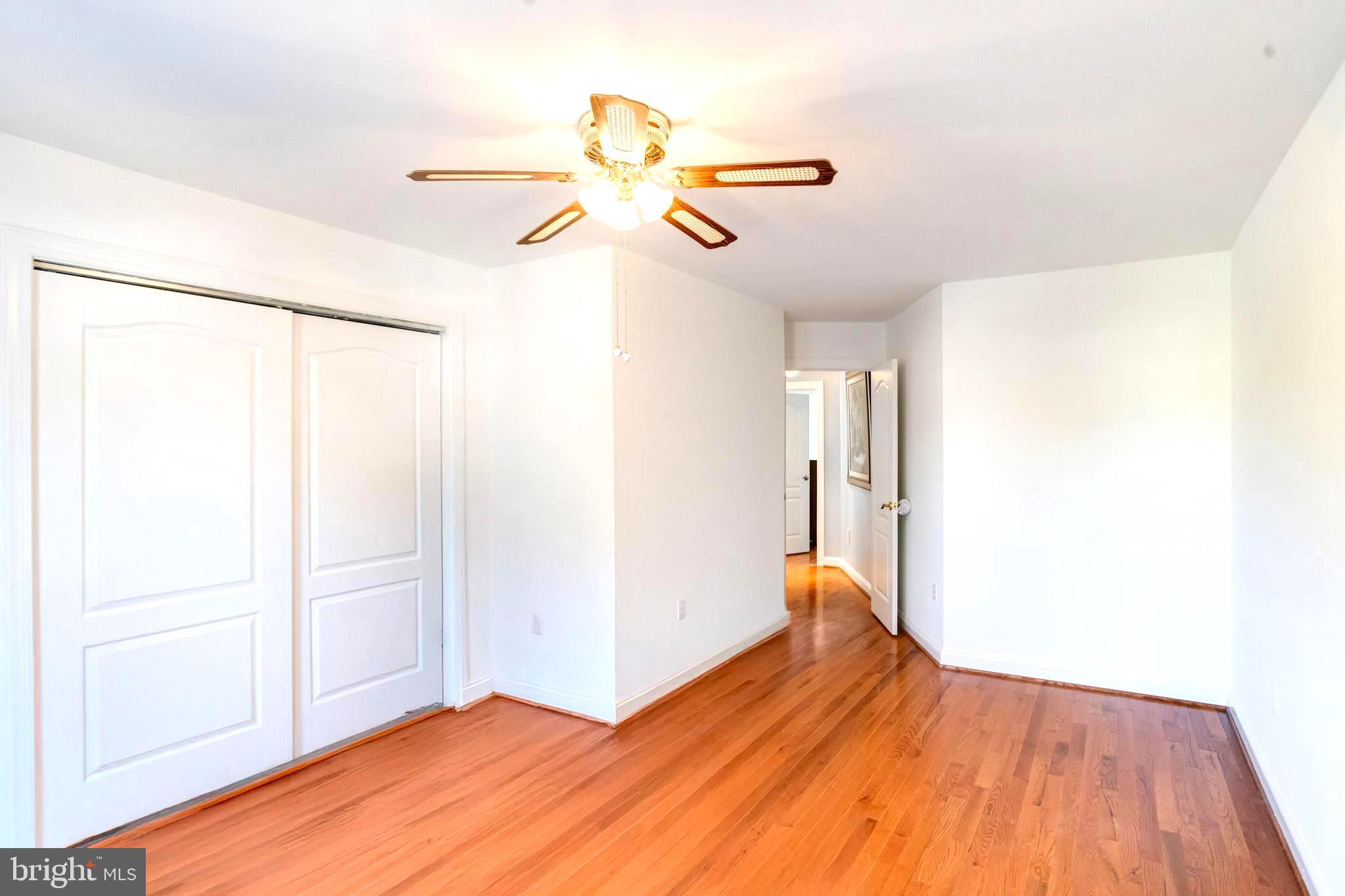 1432 Shore Road Baltimore, MD 21220 - Photo 40 of 63 a view of empty room with wooden floor