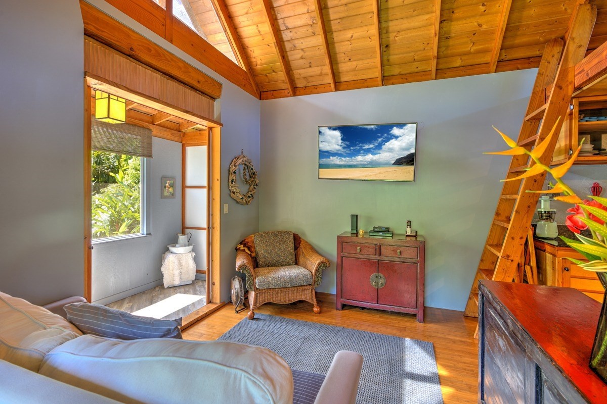 4680 Apopo Road Kapaa, HI 96746 - Photo 12 of 20 a bedroom with furniture and a window