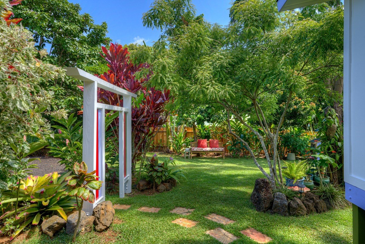 4680 Apopo Road Kapaa, HI 96746 - Photo 20 of 20 a backyard of a house with lots of green space