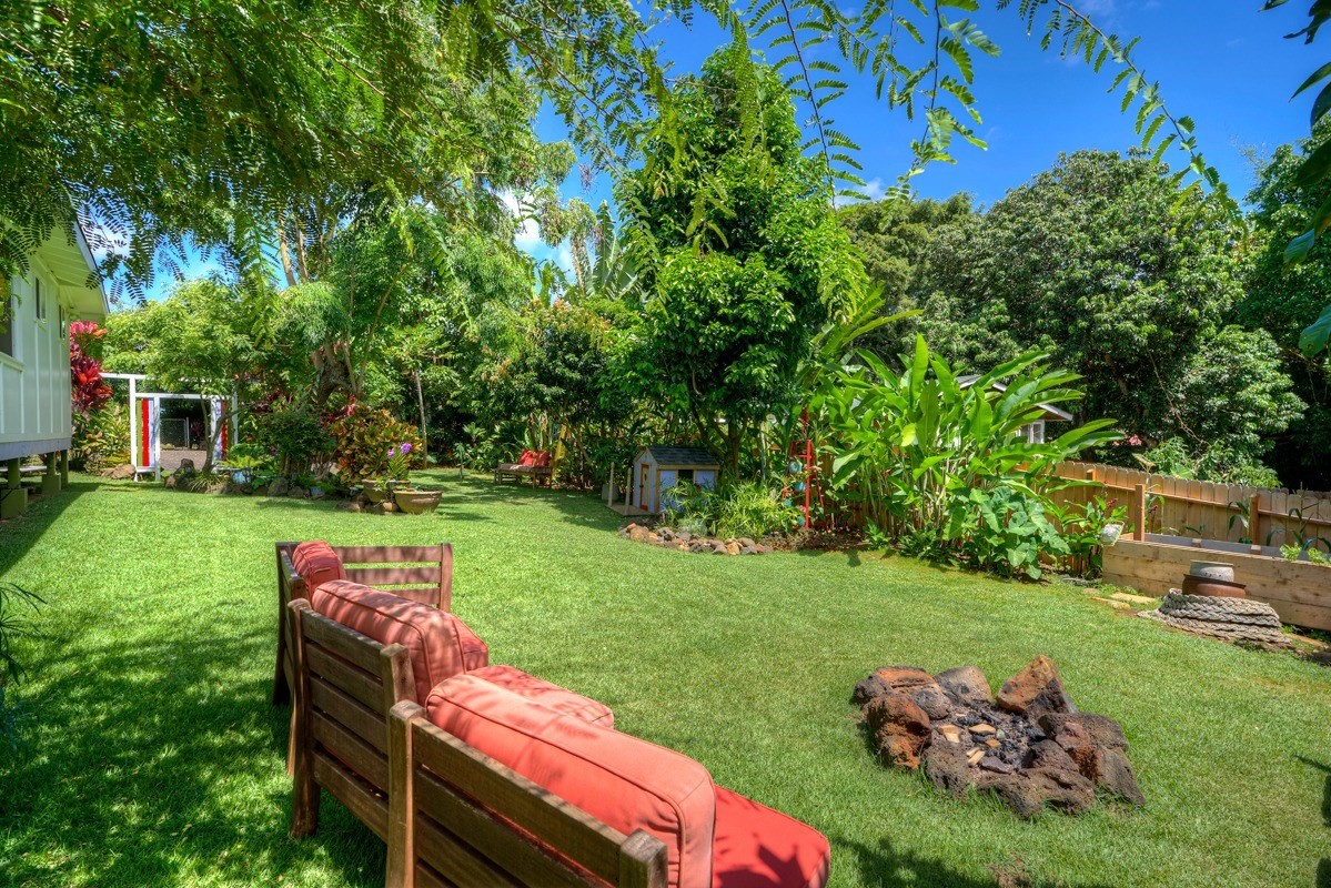 4680 Apopo Road Kapaa, HI 96746 - Photo 6 of 20 a view of backyard with seating area and green space
