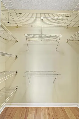 a view of a room with racks on the wall