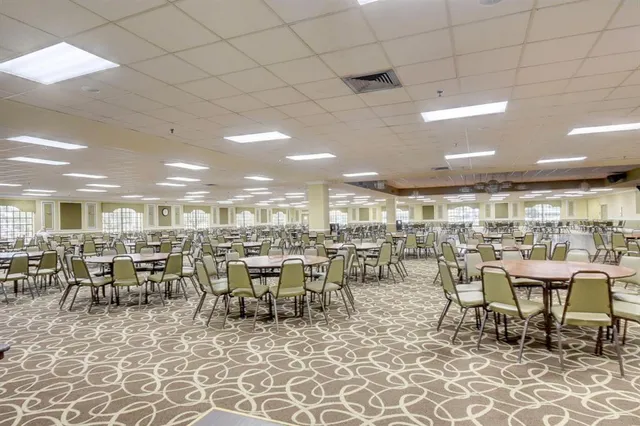 a large dining space with lots of furniture