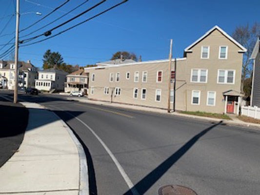 2-12 Chace Street Clinton, MA 01510 - Photo 2 of 5 a front view of a building with streets and trees