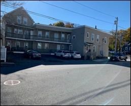 2-12 Chace Street Clinton, MA 01510 - Photo 3 of 5 a view of building with yard