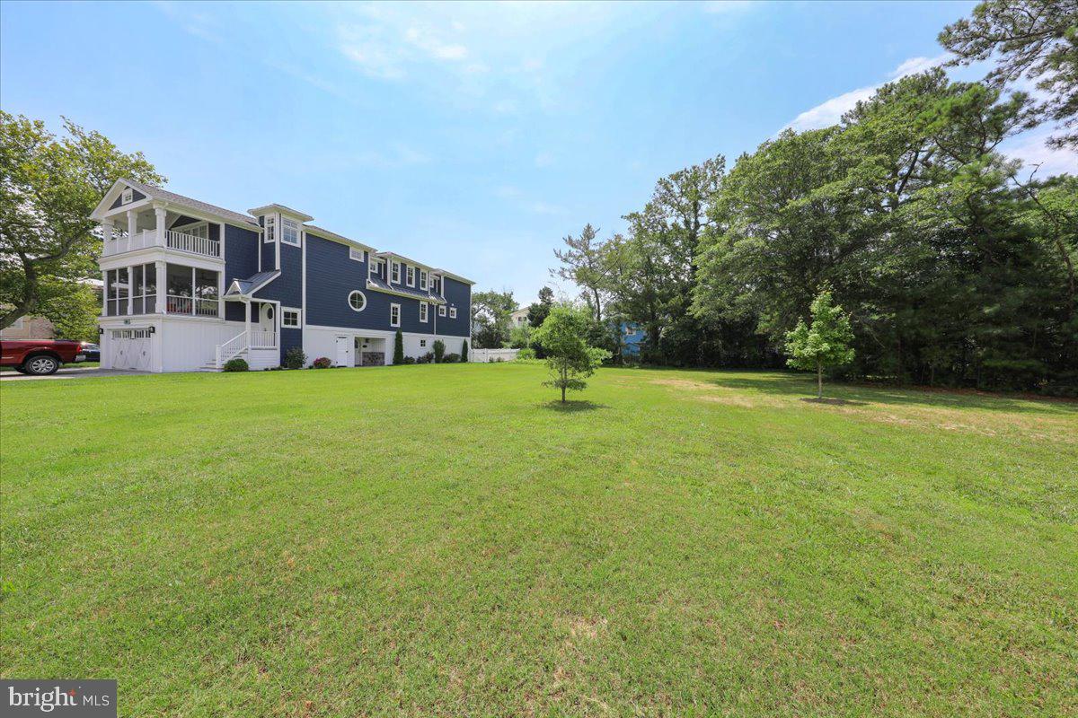 312 Garfield Parkway Bethany Beach, DE 19930 - Photo 12 of 16 a view of a house with a big yard