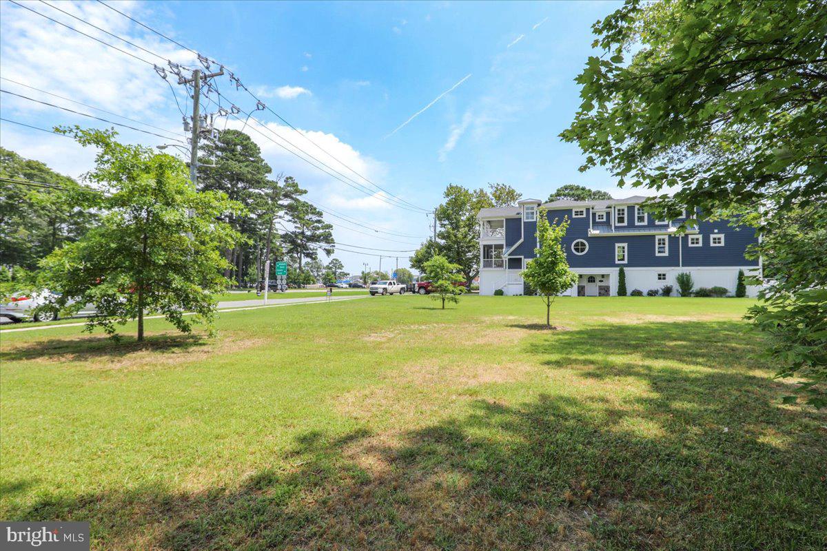 312 Garfield Parkway Bethany Beach, DE 19930 - Photo 16 of 16 a view of a house with a big yard