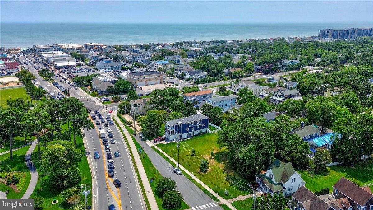 312 Garfield Parkway Bethany Beach, DE 19930 - Photo 5 of 16 an aerial view of residential houses with outdoor space and trees