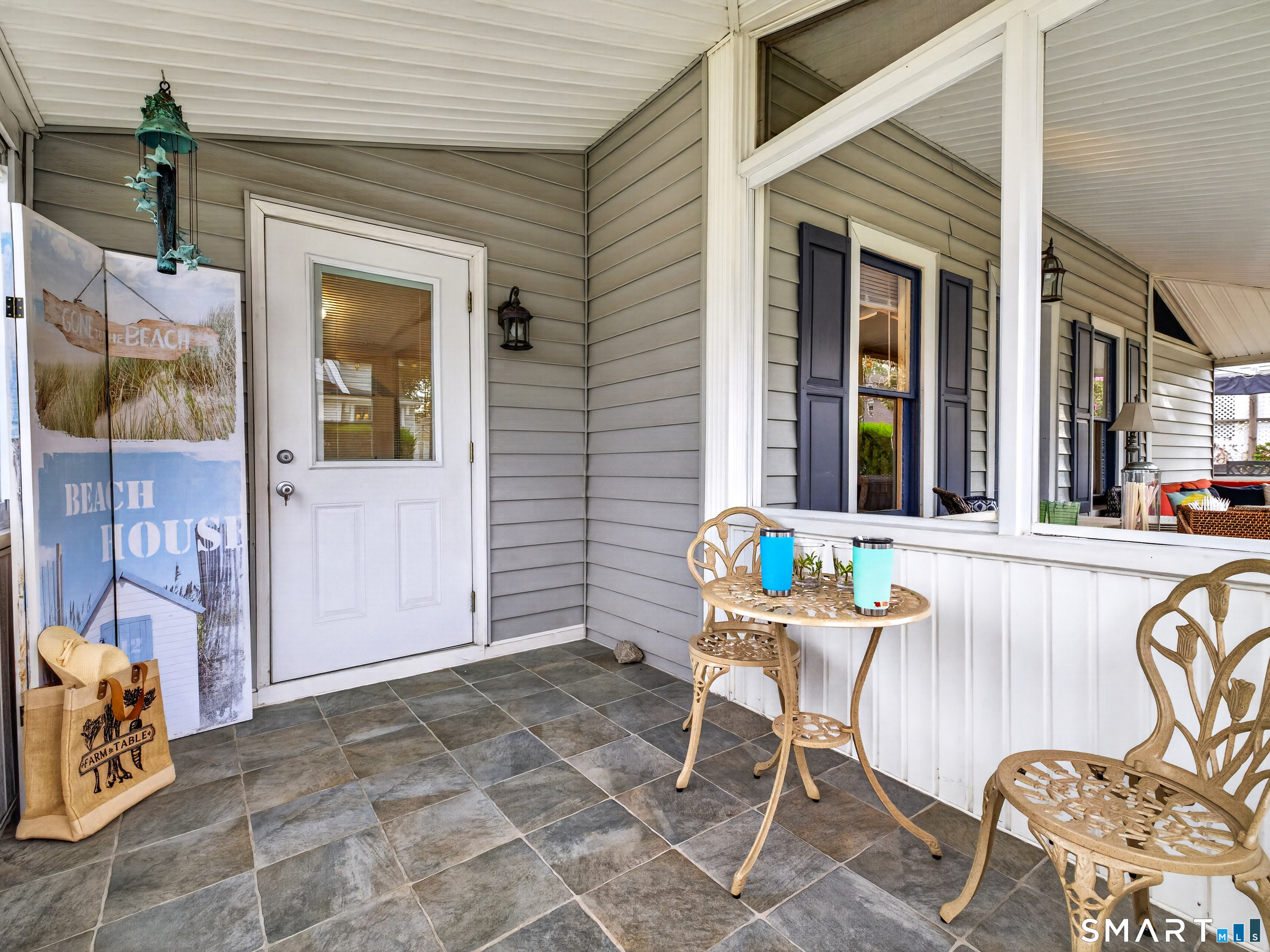 31 Old Colony Road Old Lyme, CT 06371 - Photo 28 of 38 a balcony with table and chairs