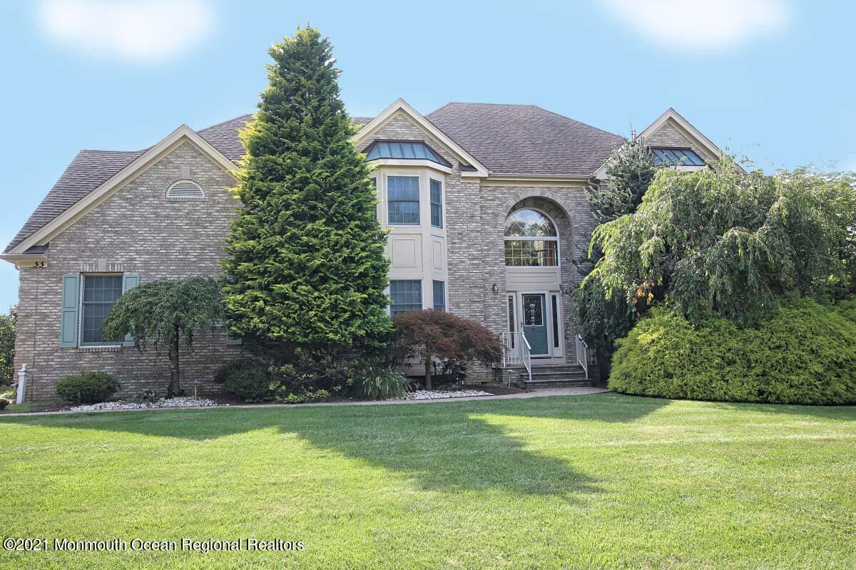 33 Maher Road Freehold, NJ 07728 - Photo 1 of 46 a front view of a house with garden