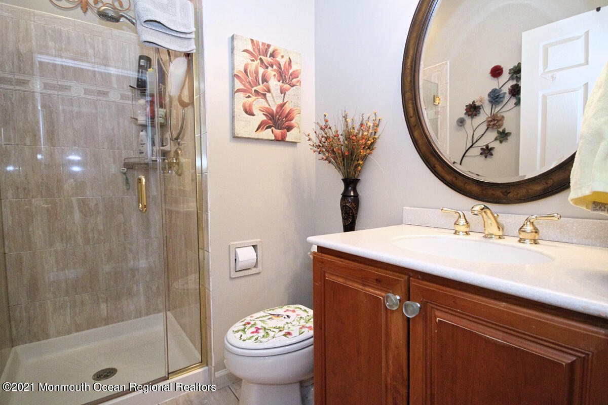 33 Maher Road Freehold, NJ 07728 - Photo 12 of 46 a bathroom with a sink and a mirror