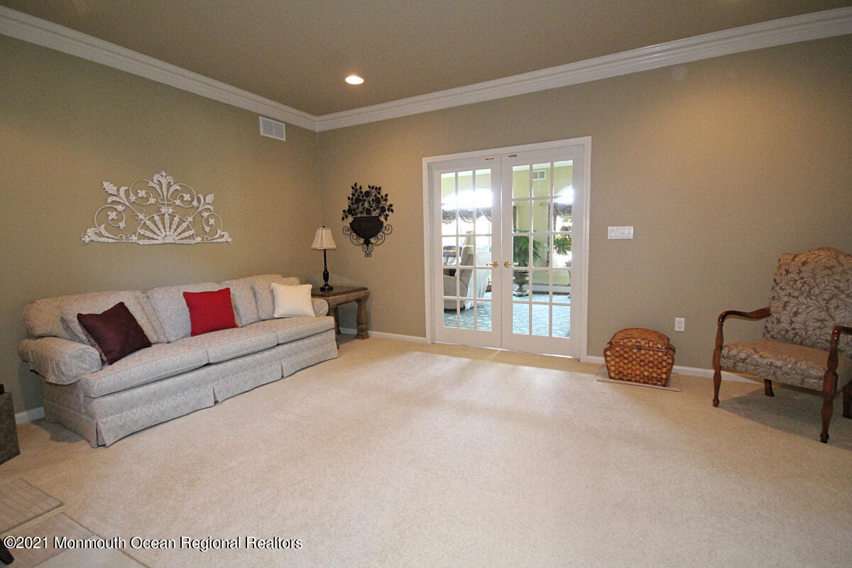 33 Maher Road Freehold, NJ 07728 - Photo 14 of 46 a living room with furniture and a window