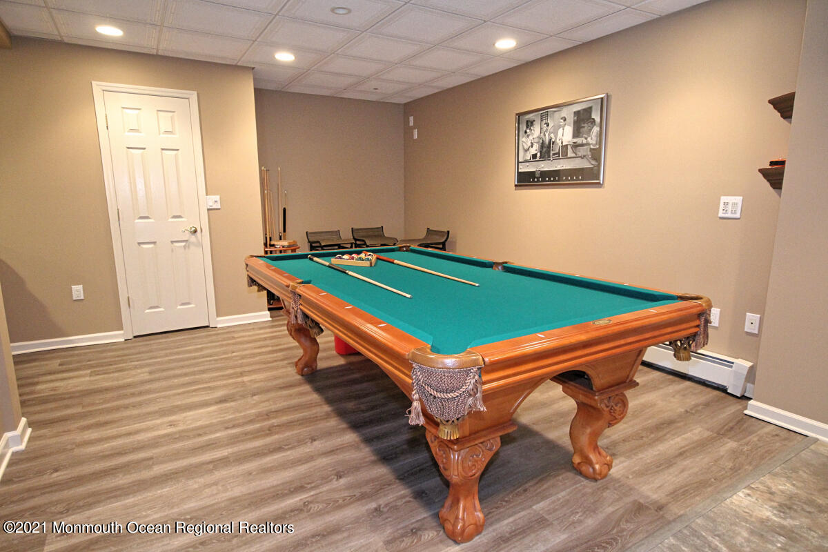 33 Maher Road Freehold, NJ 07728 - Photo 34 of 46 a room with pool tables and windows
