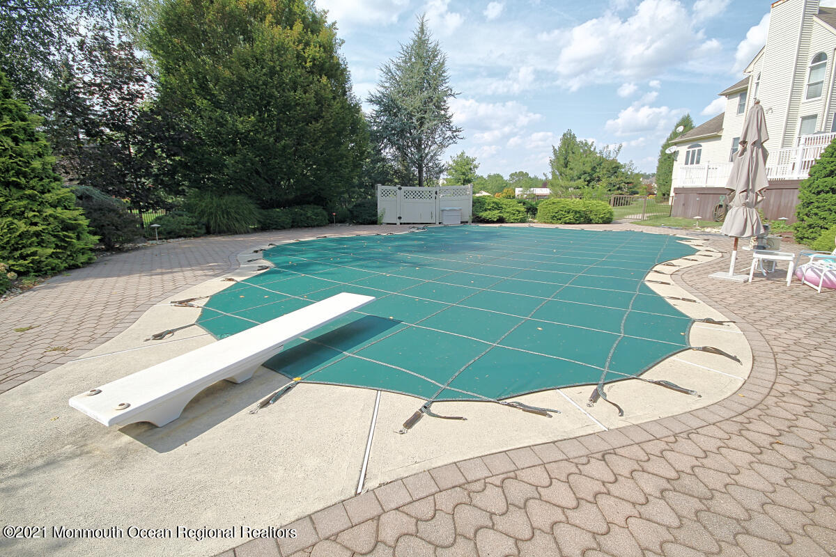 33 Maher Road Freehold, NJ 07728 - Photo 37 of 46 a view of a backyard