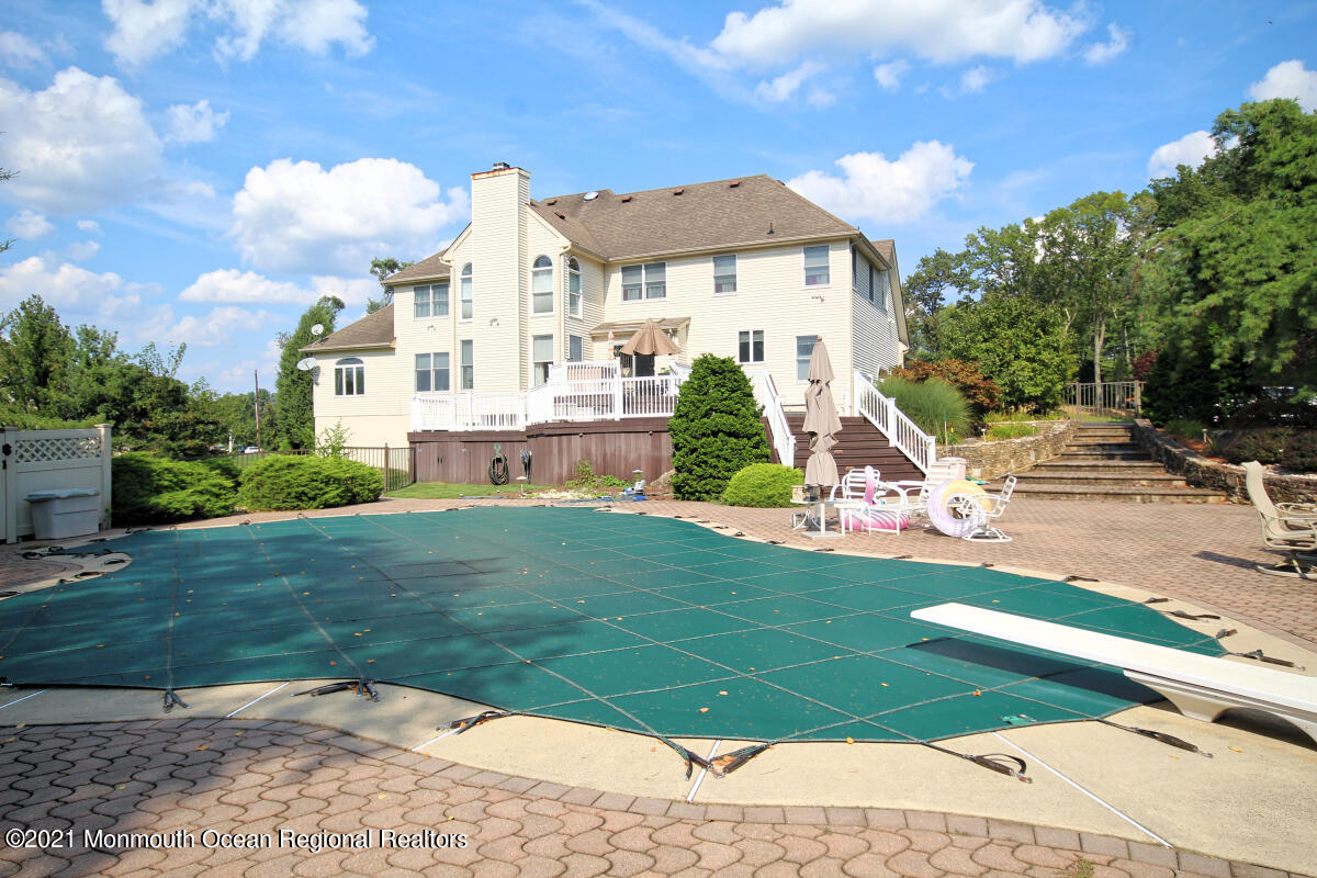 33 Maher Road Freehold, NJ 07728 - Photo 38 of 46 a front view of a house with garden