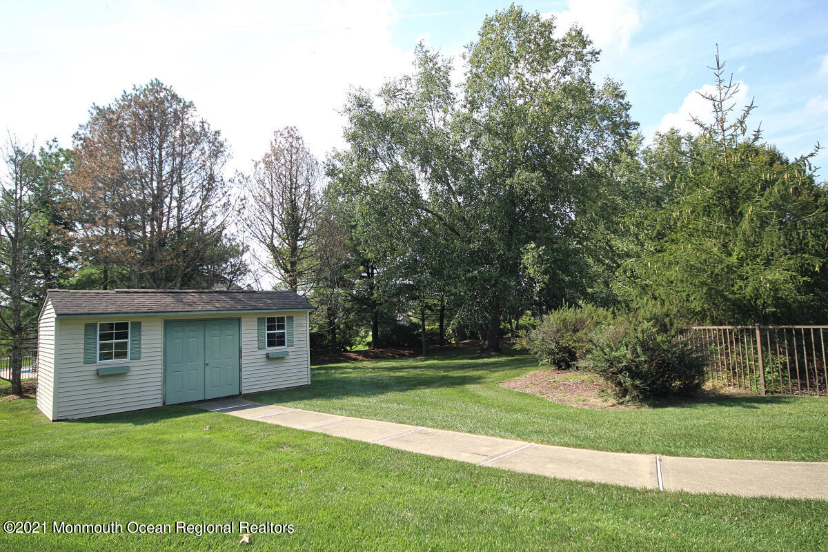 33 Maher Road Freehold, NJ 07728 - Photo 43 of 46 a view of a house with a yard