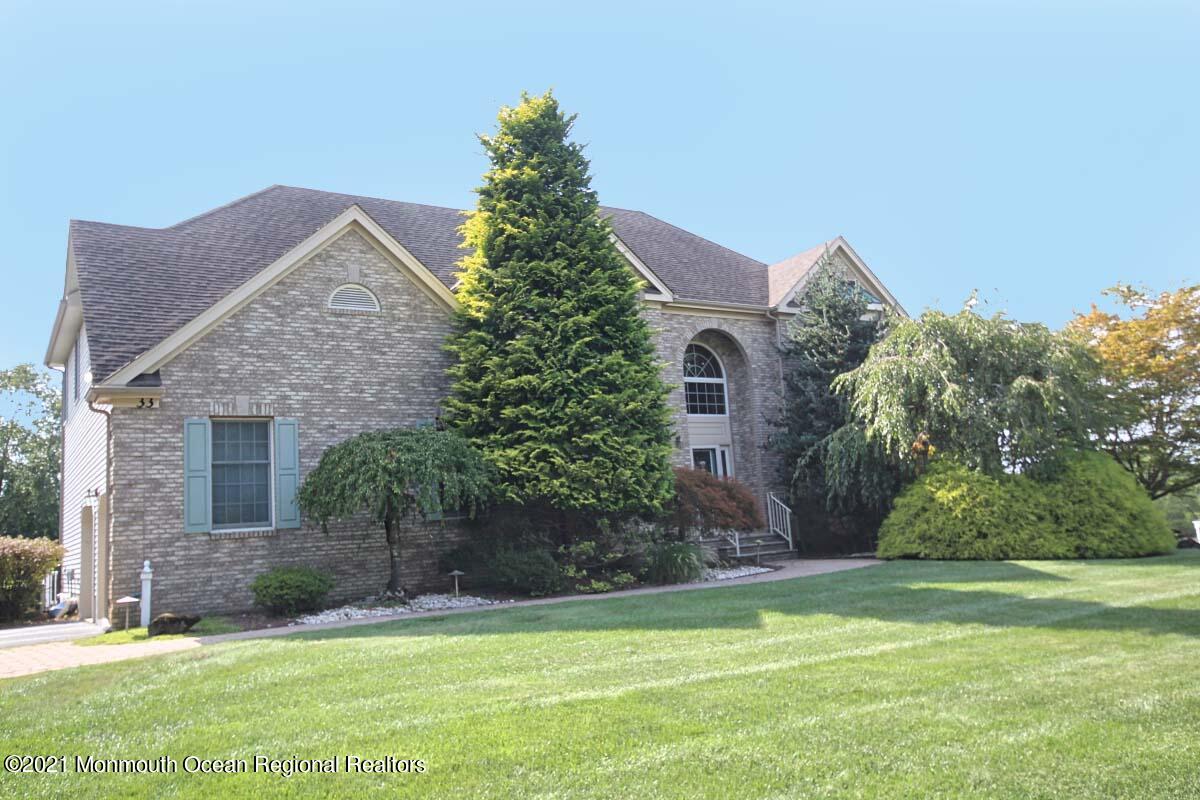 33 Maher Road Freehold, NJ 07728 - Photo 45 of 46 a front view of a house with garden
