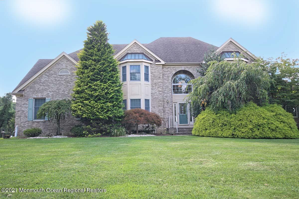 33 Maher Road Freehold, NJ 07728 - Photo 46 of 46 a front view of a house with garden